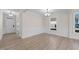 Bright dining room with hardwood floors and wainscoting at 1019 Gibson House Dr, Burlington, NC 27215