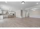 Open concept kitchen with island, stainless steel appliances, and stylish backsplash at 1019 Gibson House Dr, Burlington, NC 27215