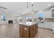 Open concept kitchen with large island and stainless steel appliances at 1019 Gibson House Dr, Burlington, NC 27215