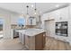 Spacious kitchen with island, stainless steel appliances, and white cabinets at 1019 Gibson House Dr, Burlington, NC 27215
