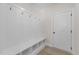 Functional mudroom with bench, cubbies, and hooks at 1019 Gibson House Dr, Burlington, NC 27215