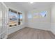 Bright office with hardwood floors, wainscoting, and large windows at 1019 Gibson House Dr, Burlington, NC 27215