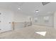 Spacious upstairs hallway with carpet, doors to bedrooms, and a staircase at 1019 Gibson House Dr, Burlington, NC 27215