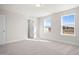 Spacious bedroom with two windows and carpet flooring at 1078 Gibson House Dr, Burlington, NC 27215