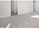 Spacious bedroom with carpet flooring and access to hallway at 1078 Gibson House Dr, Burlington, NC 27215