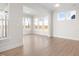 Sun-drenched breakfast nook with hardwood floors and multiple windows at 1078 Gibson House Dr, Burlington, NC 27215