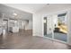 Open dining area with hardwood floors and view into the kitchen at 1078 Gibson House Dr, Burlington, NC 27215