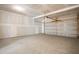 Spacious garage with overhead door and ample storage space at 1078 Gibson House Dr, Burlington, NC 27215