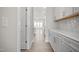 Modern kitchen with white cabinets and quartz countertops at 1078 Gibson House Dr, Burlington, NC 27215