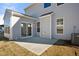 Spacious concrete patio adjacent to the house, perfect for outdoor relaxation at 1078 Gibson House Dr, Burlington, NC 27215