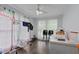 Bright, airy bedroom with natural light from the large windows and hardwood flooring at 802 N Franklin St, Wake Forest, NC 27587