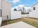A view of the backyard featuring a white privacy fence at 18 Clementine Street St # 207, Angier, NC 27501