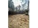 Large, undeveloped backyard space surrounded by mature trees, offering privacy and potential at 846 Cabin Creek Crk, Pittsboro, NC 27312