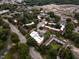 Aerial view showcasing the community with lush greenery and red brick building architecture at 1001 Hillsborough St # 304, Raleigh, NC 27603