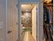 This bathroom features a walk-in shower, ceramic tile, vanity and a separate closet at 1001 Hillsborough St # 304, Raleigh, NC 27603