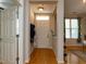 Spacious entryway with coat rack and shoe storage, transitioning into other rooms at 1001 Hillsborough St # 304, Raleigh, NC 27603