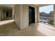 Hallway with a window at the end of the hall with a view to the exterior of the building at 1001 Hillsborough St # 304, Raleigh, NC 27603
