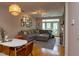 Stylish living room and dining area with hardwood floors, a decorative fireplace, and modern decor at 1001 Hillsborough St # 304, Raleigh, NC 27603