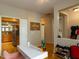 Inviting living space with hardwood flooring, leading into kitchen with stainless steel appliances at 1001 Hillsborough St # 304, Raleigh, NC 27603