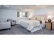 Bedroom with cozy carpet, neutral furniture, and a window bringing in lots of natural light at 3615 Octavia St, Raleigh, NC 27606
