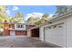 Spacious garage with ample parking and an attached carport at 3615 Octavia St, Raleigh, NC 27606