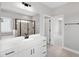 Luxurious bathroom with dual sinks and glass shower at 443 Ravensworth Dr, Garner, NC 27529