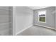 Bright closet space with wire shelving and a window for natural light at 443 Ravensworth Dr, Garner, NC 27529