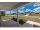 Inviting covered front porch with views of a well-maintained street and neighboring homes at 443 Ravensworth Dr, Garner, NC 27529