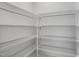 Well-organized walk-in pantry with wire shelving at 443 Ravensworth Dr, Garner, NC 27529