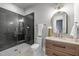 Modern bathroom with a glass walk-in shower, stylish vanity, and contemporary fixtures at 3723 Bellevue Rd, Raleigh, NC 27609