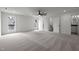 A spacious bedroom with neutral walls and carpet, plenty of natural light, and ensuite bathroom at 3723 Bellevue Rd, Raleigh, NC 27609