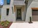 Charming front entrance features a wood framed door and manicured landscaping at 3723 Bellevue Rd, Raleigh, NC 27609