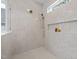 This shower is lined with marble walls and has a bench, recessed lighting, and sleek hardware at 3723 Bellevue Rd, Raleigh, NC 27609