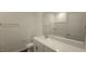 Modern bathroom featuring bright lighting and a vanity, complete with a toilet and a shower at 141 Robert Howe Dr, Fuquay Varina, NC 27526
