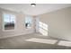 Well-lit bedroom featuring neutral walls and plush carpeting at 1519 Peabody Ct, Mebane, NC 27302