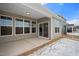 Covered back patio with sliding glass doors and windows at 1539 Peabody Ct, Mebane, NC 27302