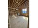 Framed second floor bedroom featuring large window openings and spaces planned for lighting at 504 Colvard Woods Way Way, Durham, NC 27713