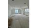 Generous bedroom with a pitched ceiling and windows offering great natural light at 504 Colvard Woods Way Way, Durham, NC 27713
