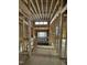 Hallway view of home's garage entrance and large window at 504 Colvard Woods Way Way, Durham, NC 27713