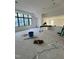 Spacious living room with large windows offering ample natural light at 504 Colvard Woods Way Way, Durham, NC 27713