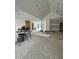 Under-construction living room with vaulted ceilings and large windows is a blank canvas for customization and natural light at 504 Colvard Woods Way Way, Durham, NC 27713