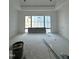 A room under construction features recessed lighting and a large window at 504 Colvard Woods Way Way, Durham, NC 27713