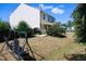 Large backyard with patio and swing set at 119 Tadworth Ct, Mebane, NC 27302