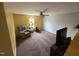 Bedroom with recliner, TV and window at 119 Tadworth Ct, Mebane, NC 27302