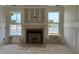 Living room with a fireplace and water views, under construction at 202 Golden Leaf Farms Rd, Angier, NC 27501