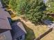 An aerial view showing the home, fenced backyard, deck and surrounding neighborhood at 3009 Gentle Breezes Ln, Raleigh, NC 27614