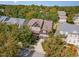 An aerial view showcasing the house nestled among lush trees and the surrounding neighborhood at 3009 Gentle Breezes Ln, Raleigh, NC 27614