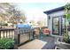 Relaxing back deck area with outdoor grill and outdoor seating area perfect for entertaining at 3009 Gentle Breezes Ln, Raleigh, NC 27614