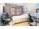 Bright bedroom with a window, neutral walls, and a white bed frame with gaming chairs at 3009 Gentle Breezes Ln, Raleigh, NC 27614