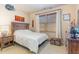 Comfortable bedroom featuring a wooden bedframe, window, and sports decor at 3009 Gentle Breezes Ln, Raleigh, NC 27614